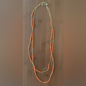 Orange beaded multistrand necklace